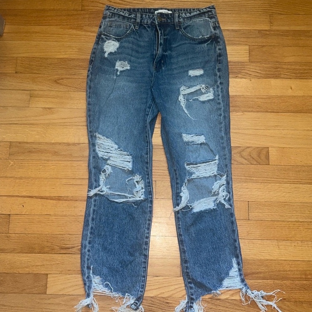 Distressed Blue Jeans